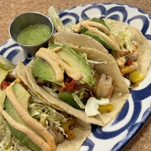 Shrimp Tacos served with rice &amp; beans on the side