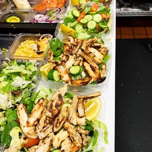 a variety of salads on a table