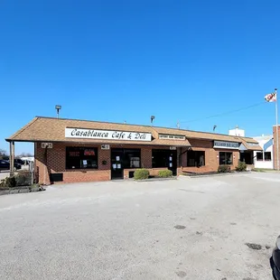 The view from the parking lot of the storefront. They are next to the fire station.