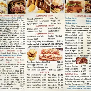 Breakfast platters, breakfast burritos, omelets, submarines, and sandwiches menu.