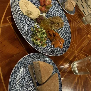 Salad appetizer to share with the table. Home made bread.