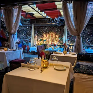 Cushion seating area looking out into the garden seating area.