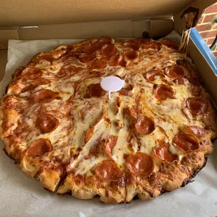 Extra cheese, pepperoni pizza did not travel that greatest but still tasted great