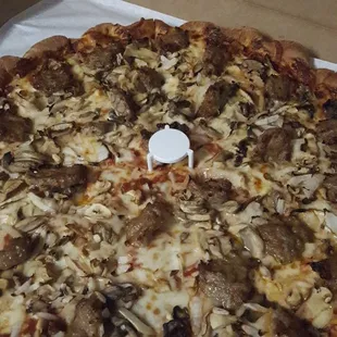 Casamel's Pizza. Sausage, onion and mushroom Large Pizza.