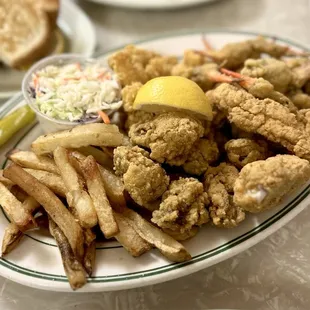 Seafood platter (oysters, shrimps, crab claws, catfish, and fries)