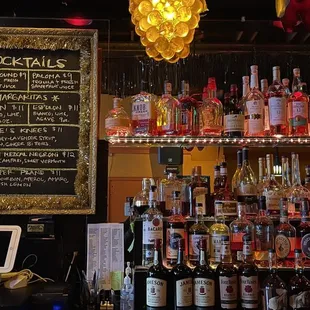 a bar with a lot of liquors