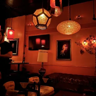 a man standing in a dimly lit room