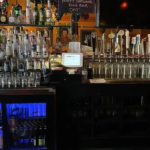 a bar with a variety of liquors