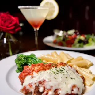Chicken Parmigiana | Parmesan crust, mozzarella, broccolini, crushed tomato, rigatoni alfredo.
