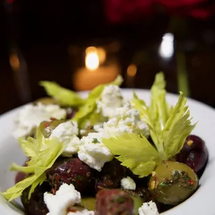 Marinated Olives | Kalamata, casteltvetrano, queen olives, goat cheese, oregano, chili flakes.