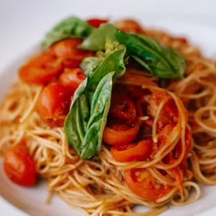 Capellini à La Checca | Angel hair, cherry tomatoes, basil, olive oil, garlic.