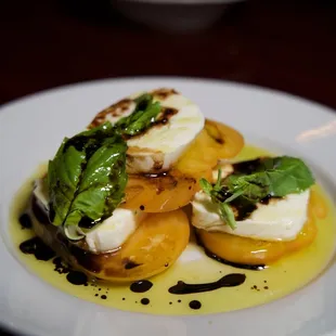 Caprese | Heirloom tomato, basil leaves, sea salt, fresh cracked pepper, balsamic.