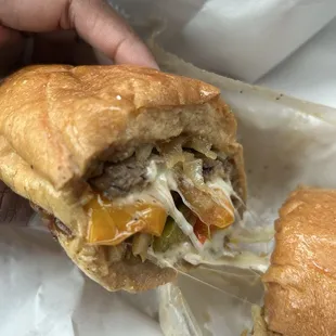 Cheesesteak with grilled onions and sweet bell peppers