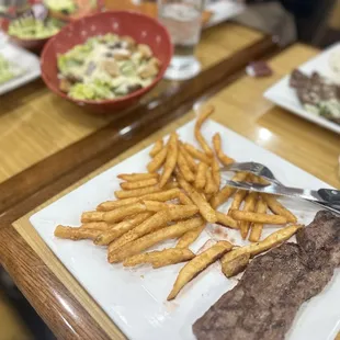 a steak and french fries