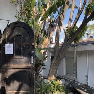 Entrance is on the side of driveway