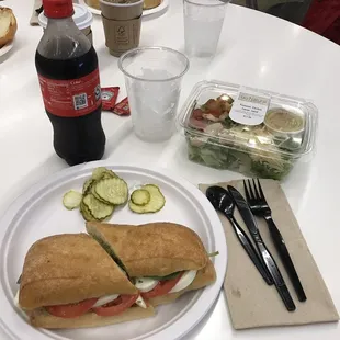 a sandwich and salad on a plate
