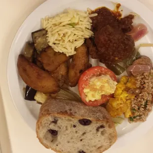 Food from the Global Cuisine, salad bar, and Chef's Table areas.