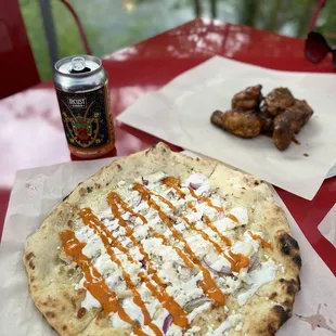 A small Russell pie with some delicious apple wood smoked wings and a can of honey pear cider from Locust cider to wash it down.