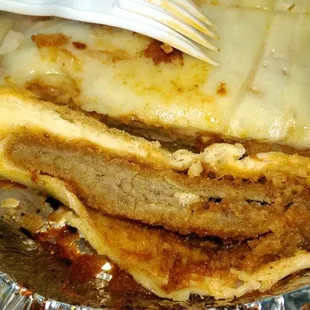 Up close of the breaded steak sandwich.