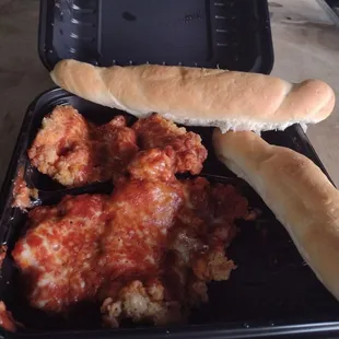 Chicken parmesan and bread sticks