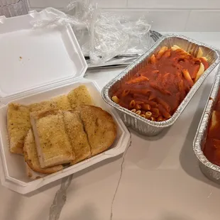 three containers of food