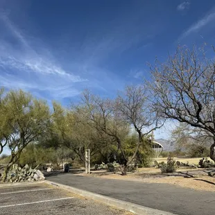Small park with playground and porta-potty
