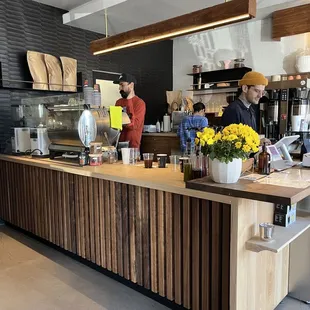 a coffee shop with people working