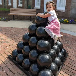 Cannonballs in front of the entrance