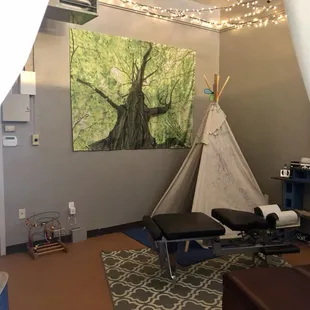 Your kiddos can play in the teepee while you're being adjusted.