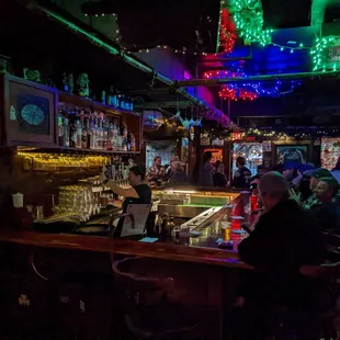 people sitting at the bar