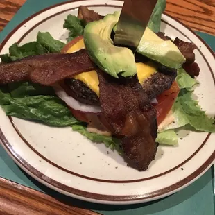 Bunless bacon avocado cheeseburger