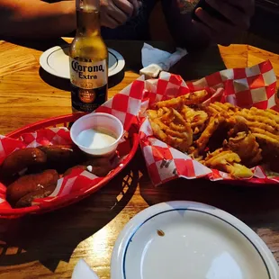 Waffle fries and jalenpeno poppers, both come out crispy and hot.