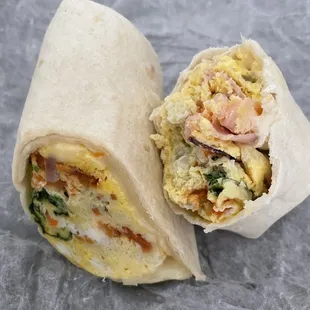 Omelette Wrap - must try!! It&apos;s has ham, eggs, tomatoes, spinach and onions.