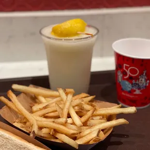 a tray of fries and a drink