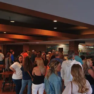 a large group of people in a restaurant