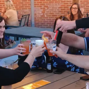 a group of people toasting