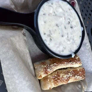 Potato soup and two breadsticks