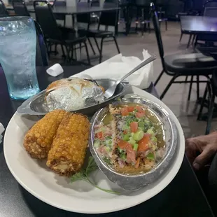 Salmon dinner with sweet potato and roasted corn