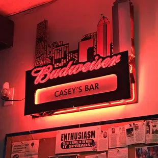 a neon sign in a bar