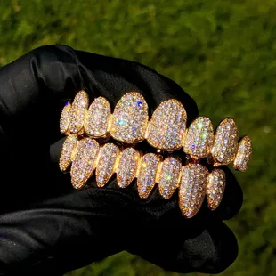 We buy gold grills as well !