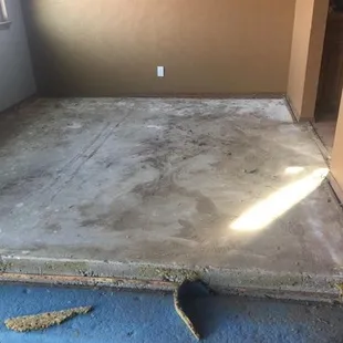 a room with a concrete floor