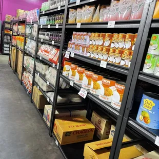a grocery store aisle filled with goods
