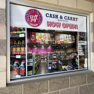 a cash and carry store window