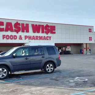 a car parked in front of a store