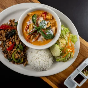 Lunch Combo choose two items you like. Served with rice and salad. Highly recommended Pad Thai and Green Curry or Basil and Tom Kha