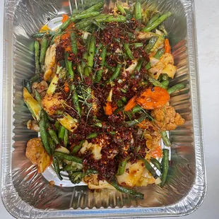 Stir-fried with green beans, bell pepper, garlic, basil, and kaffir leaves in Prik Khing paste. Best for vegan option