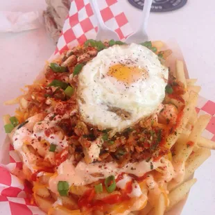 Kimchi fries with a fried egg on top. Yummy.