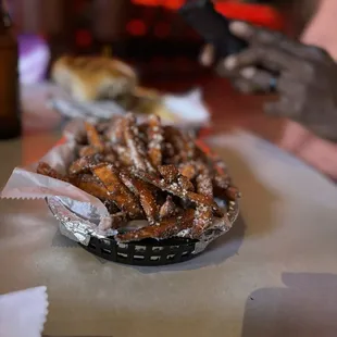 The Basket Case sweet potato fries. Phenomenal. Crispy and delicious. Fried just right. Parmesan cheese.