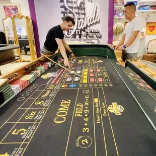 Strategy rundown with Nick at one of the craps table.