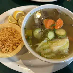 a bowl of soup and rice